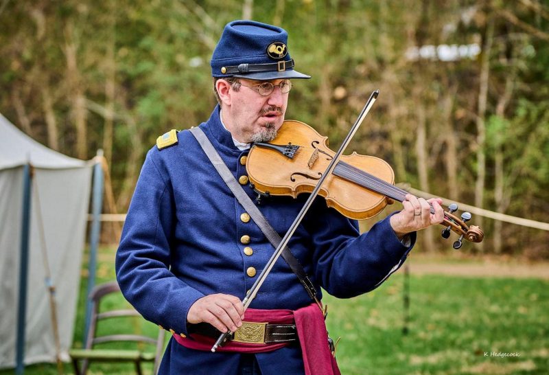 Geoff White playing music 