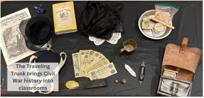 Civil War replica items from the Traveling Trunk laid out on a table. 